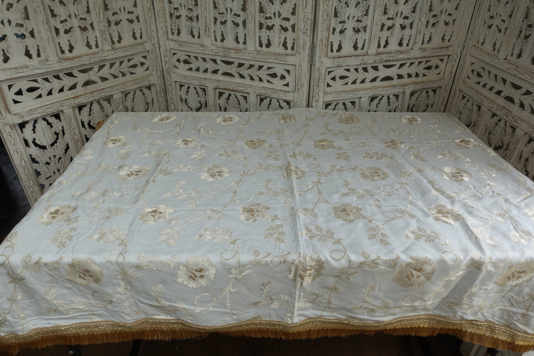 White And Gold Fringed Table Cloth